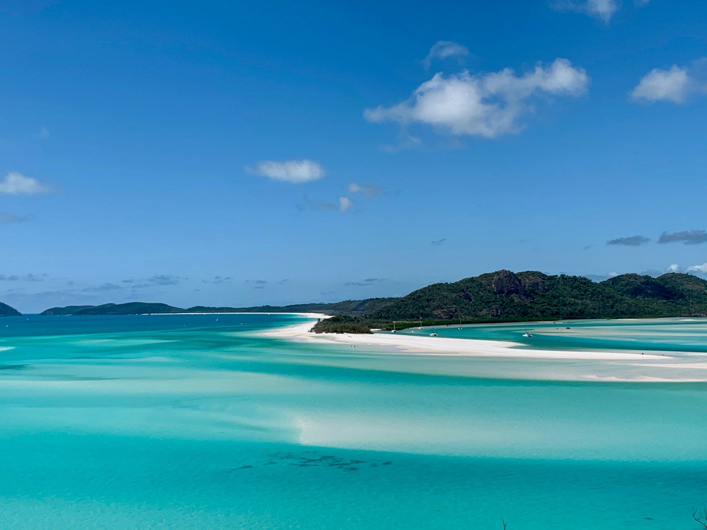 White sandbars and turquoise shallows at Whitehaven Beach in the Whitsunday Islands, Queensland, Australia.