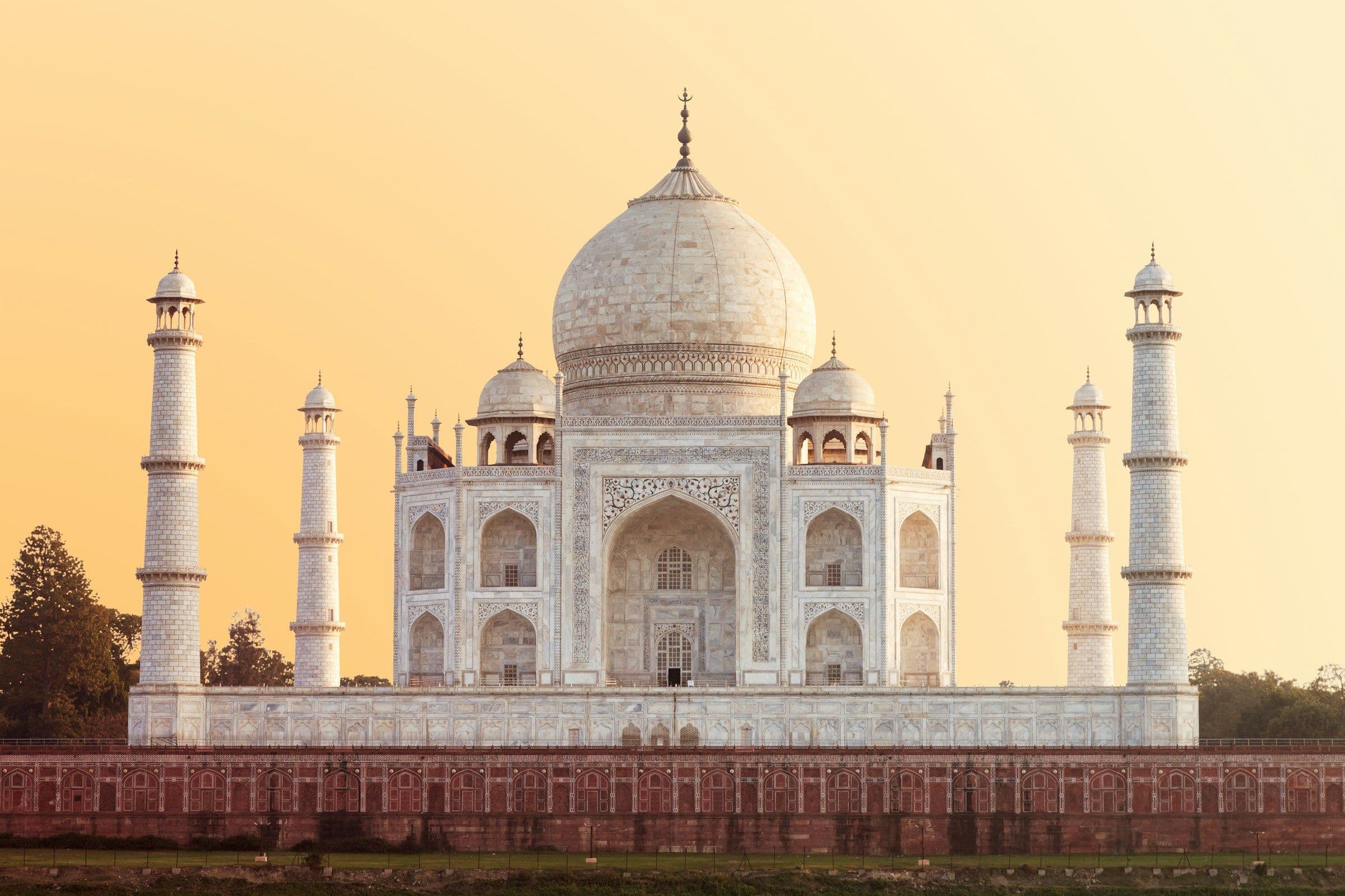 The Taj Mahal in Agra, India, in warm evening light.