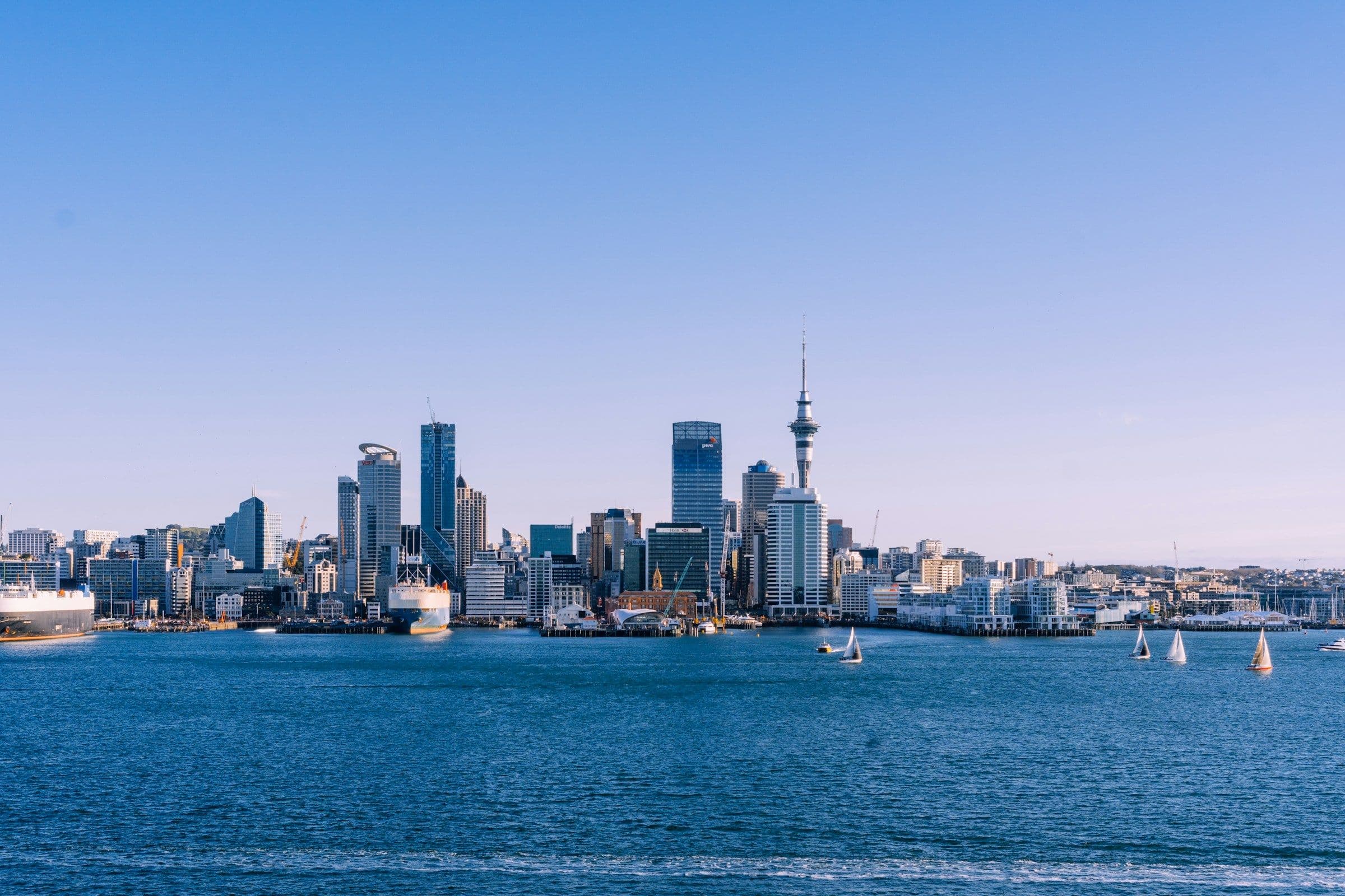 The towers of central Auckland and the Sky Tower, seen across the harbour on a clear day.