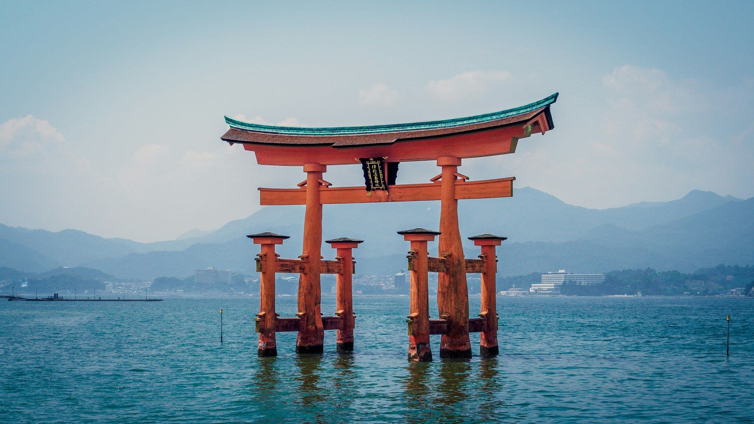 The torii gate of Itsukushima Shrine standing in the sea off the island of Miyajima, Japan.