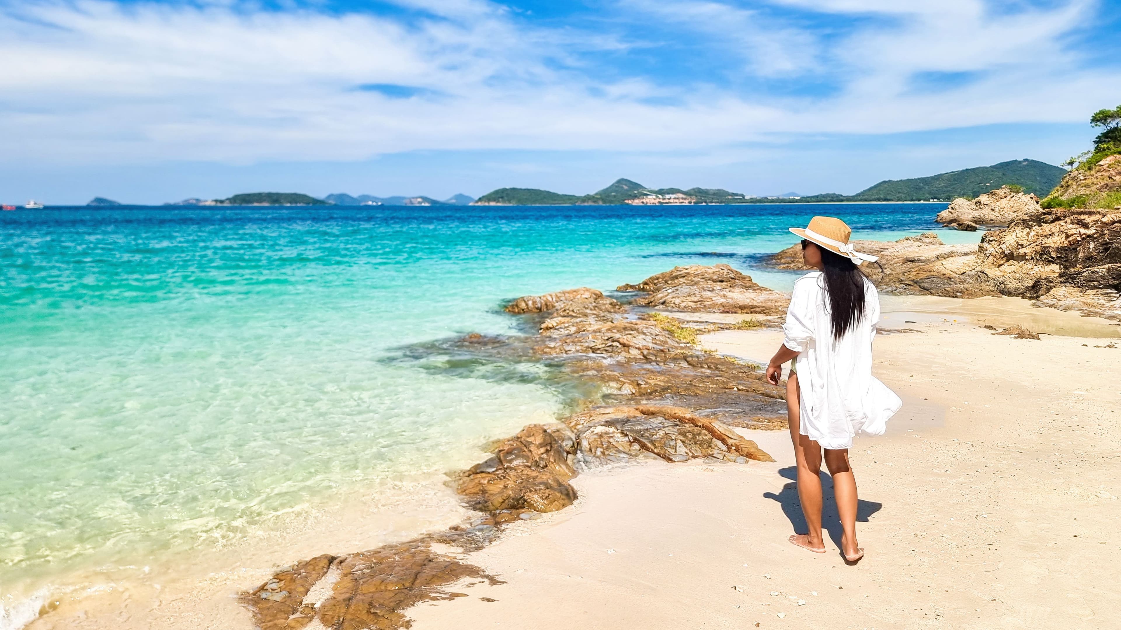Relaxing by the tranquil shores of Samae San Island in Thailand on a sunny day