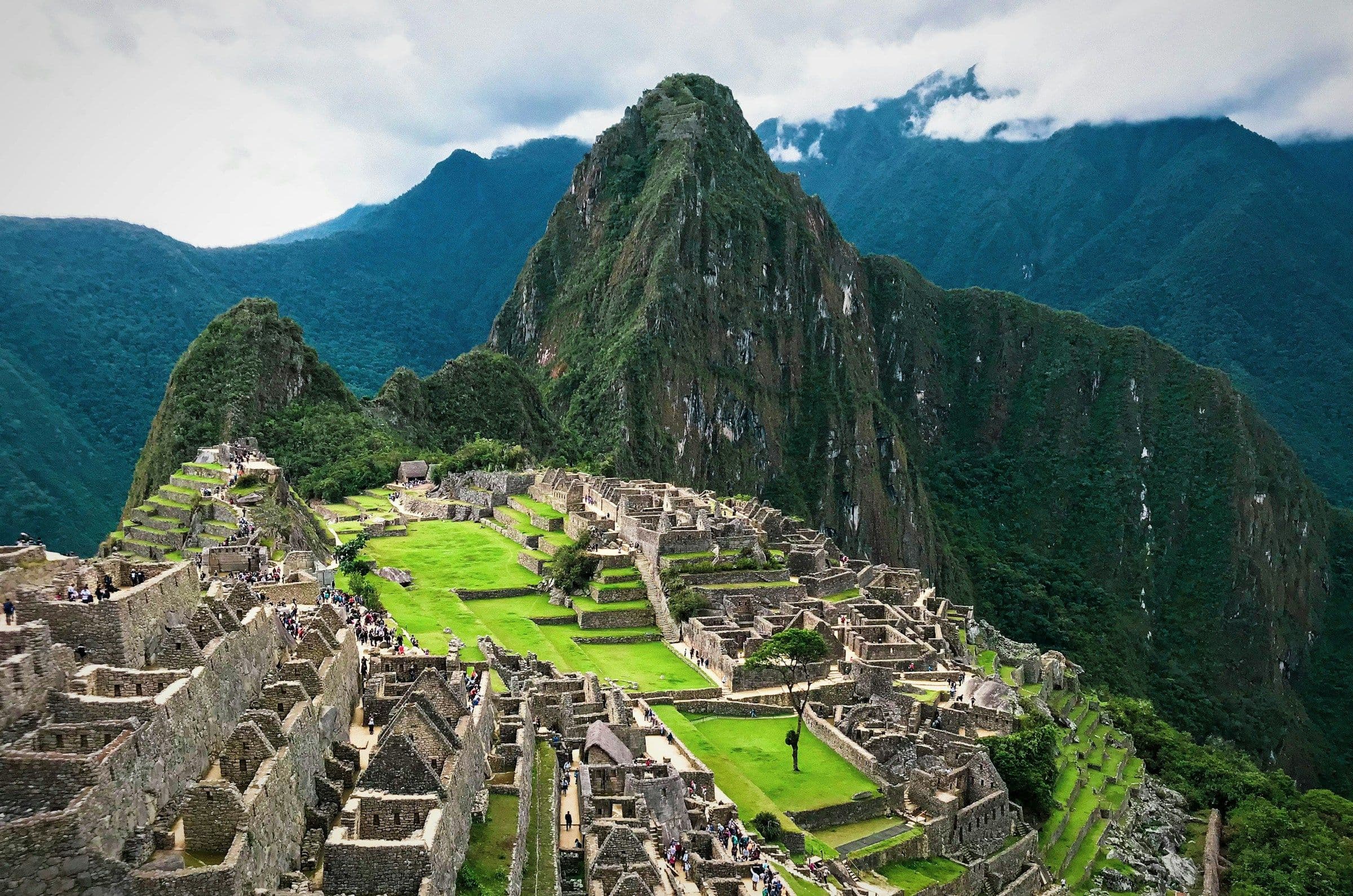 The Inca ruins of Machu Picchu on a ridge beneath Huayna Picchu mountain in Peru.