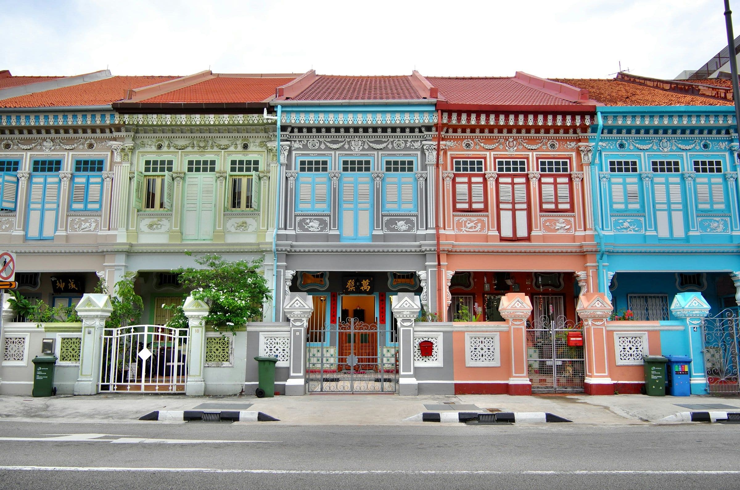 A row of pastel-coloured Peranakan terraced houses in Joo Chiat, Singapore.