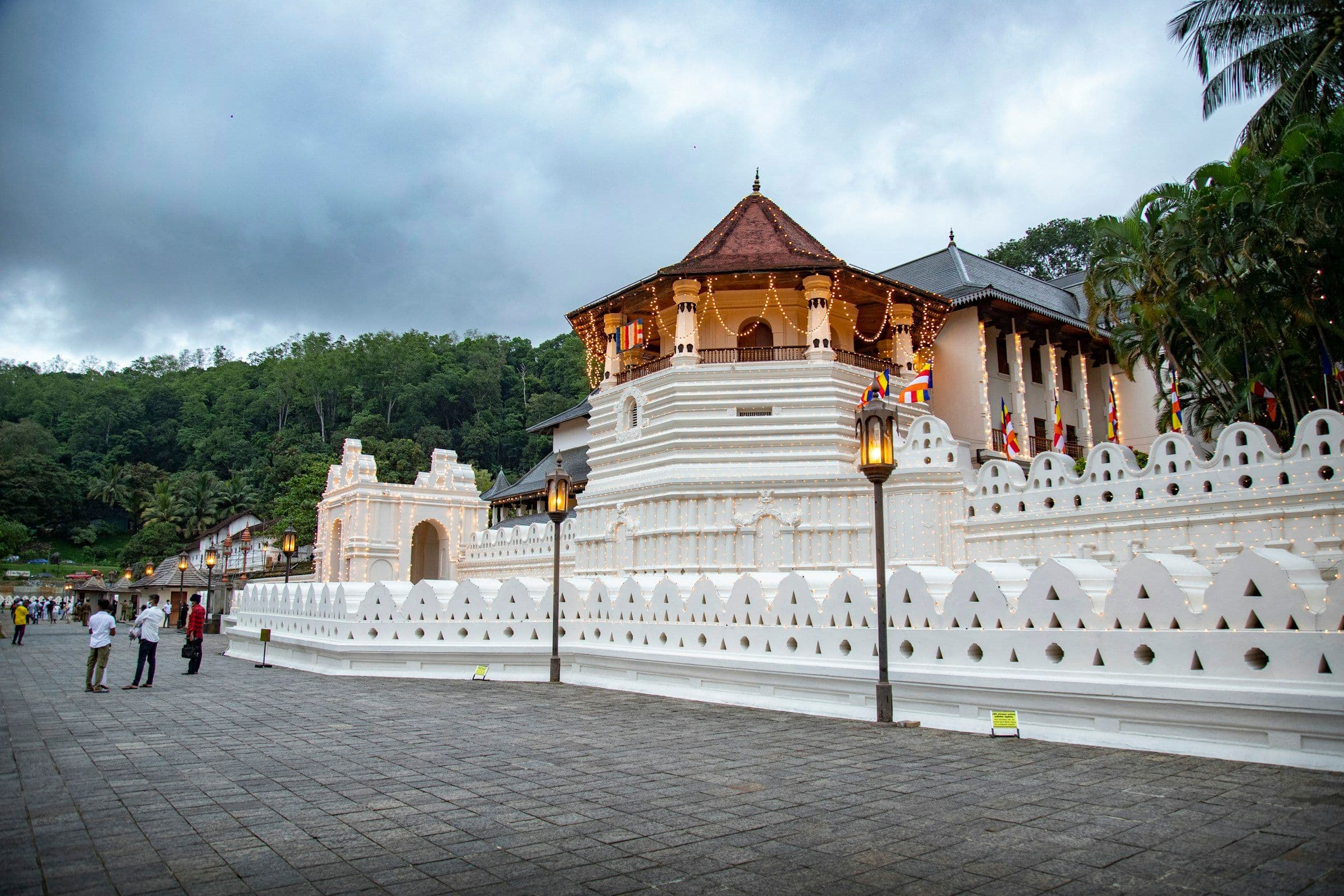 The white walls and octagonal tower of the Temple of the Sacred Tooth Relic in Kandy, Sri Lanka.